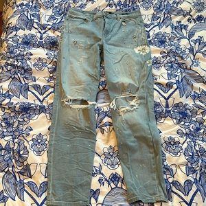 Express light wash high rise ripped jean with floral paint detail